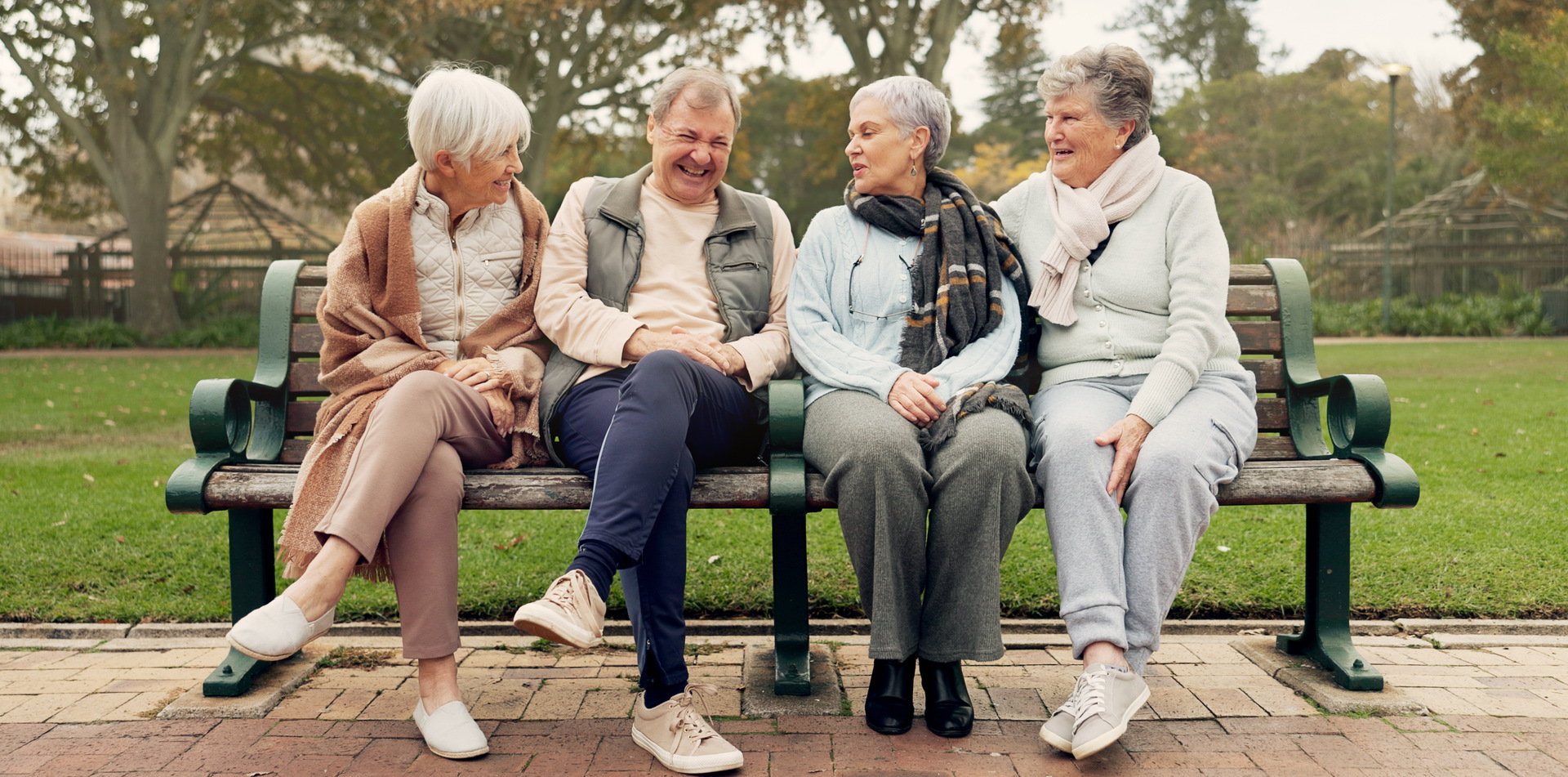 Group of seniors boarding a comfortable charter coach bus for a day trip outing in Toronto