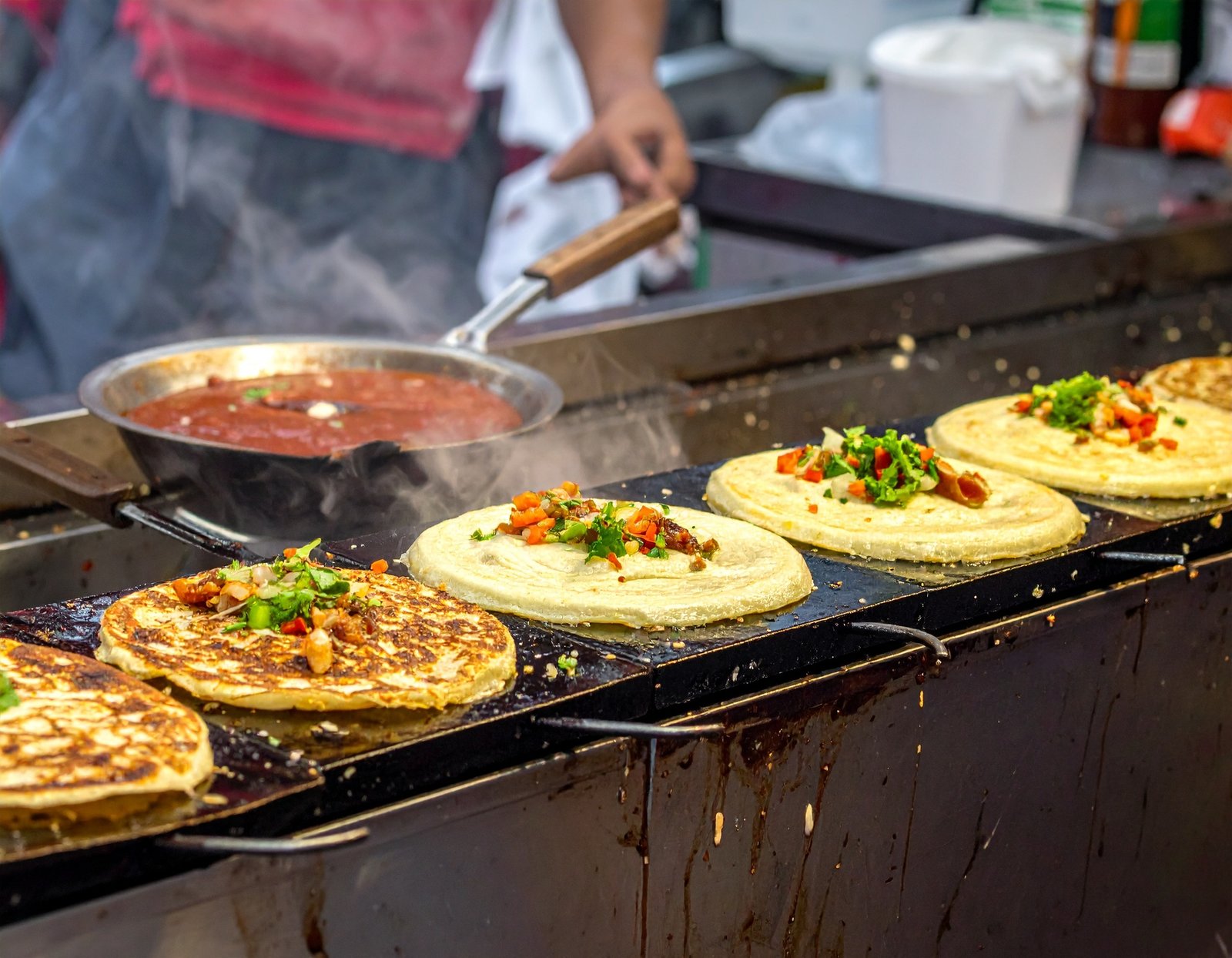 Group of food enthusiasts on a Toronto neighbourhood food tour by charter bus