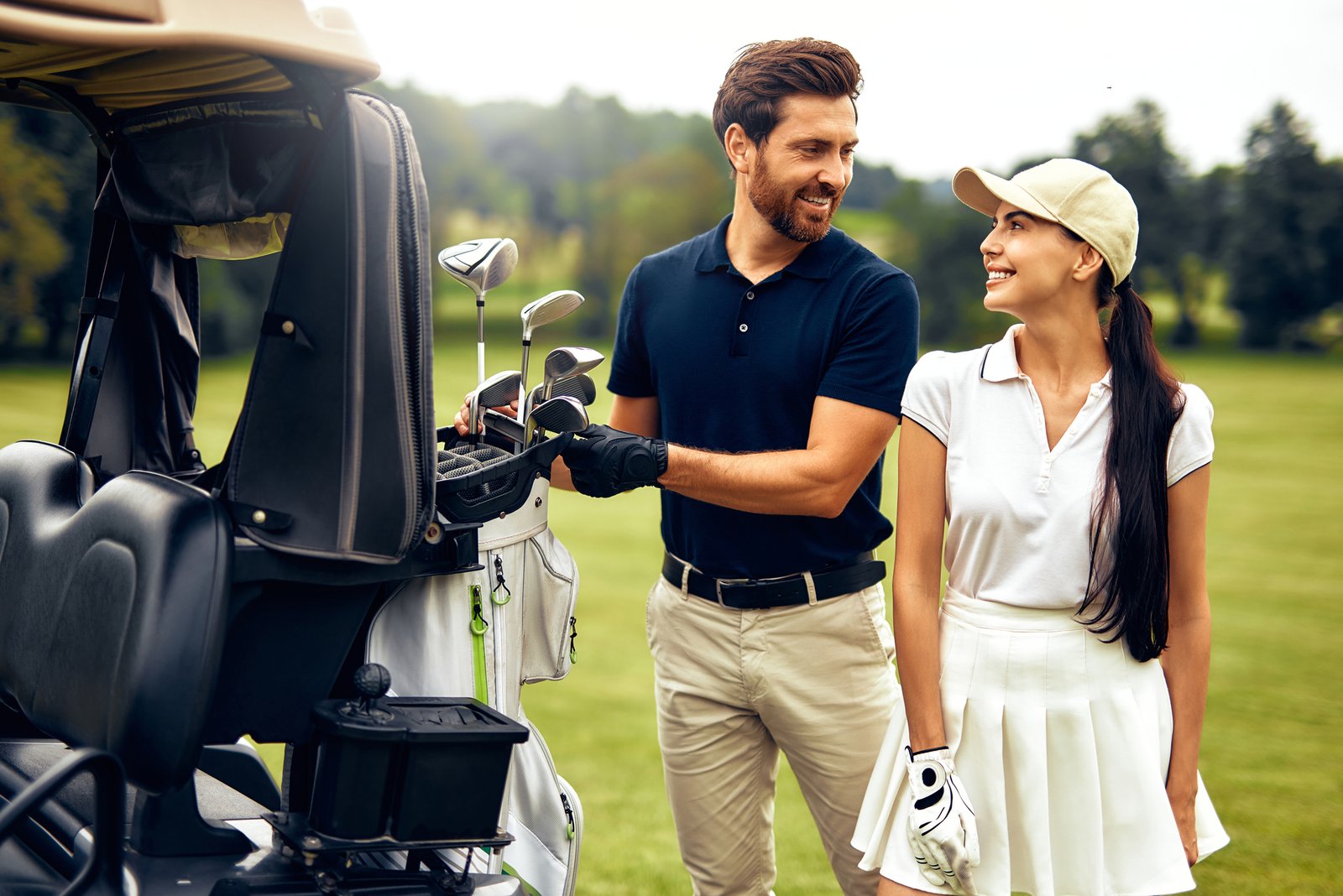 Golf group loading clubs onto a charter bus for a golf day trip in Ontario